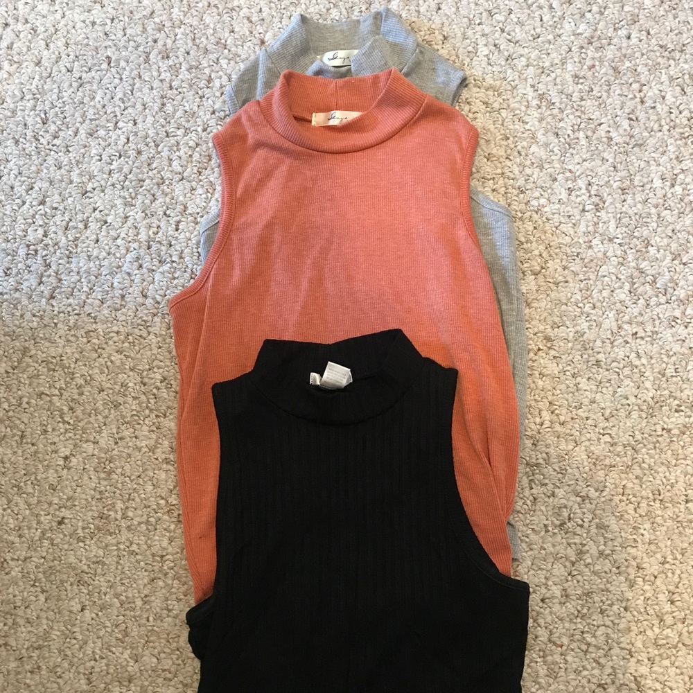 THREE size small crop top shirts.